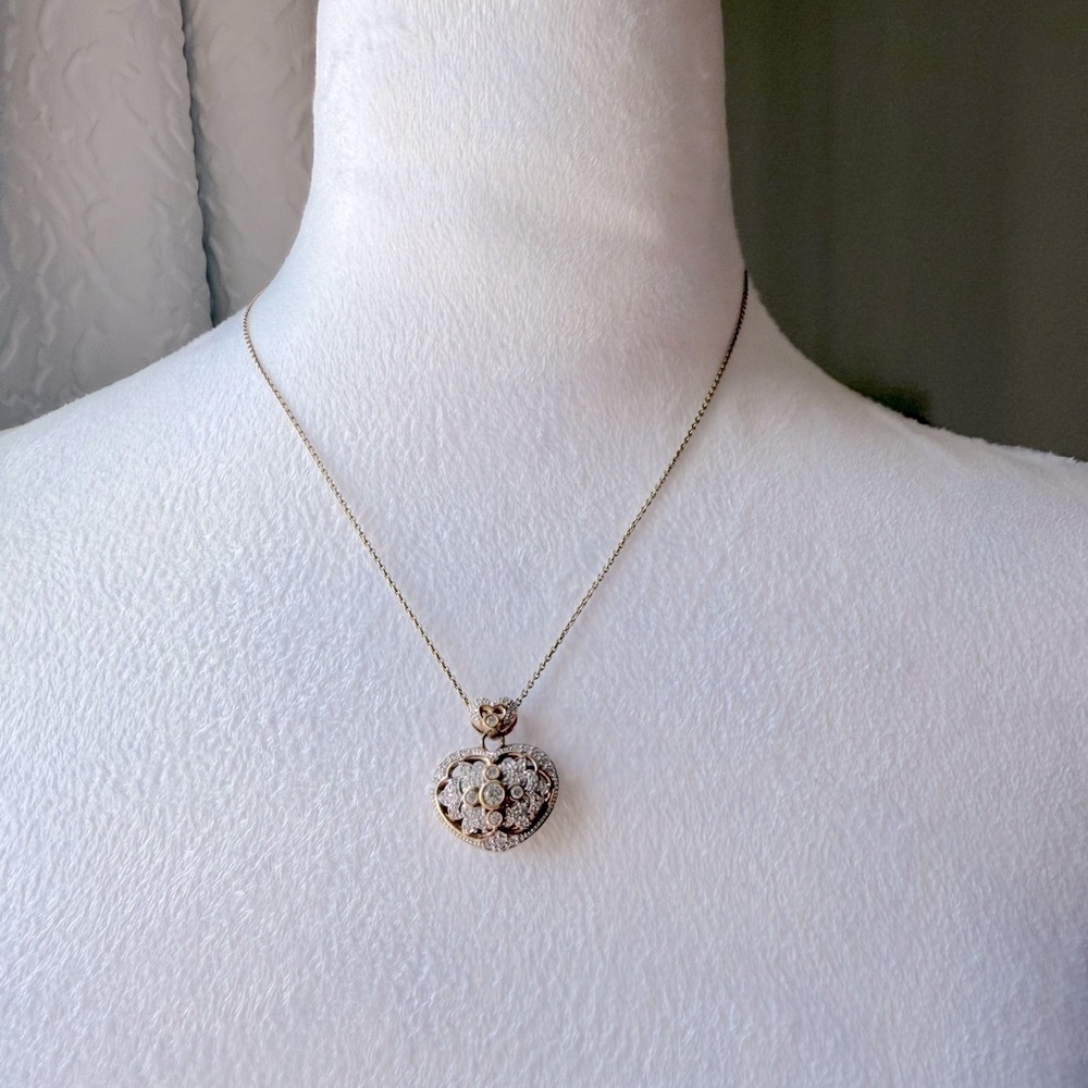 Vintage Sterling silver heart filigree pendant
